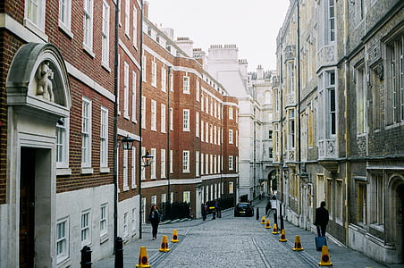 Road Concrete Pavement Surrounded by Brown and Gray Concrete Buildings thumbnail