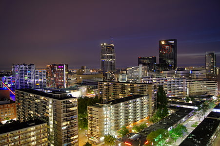 aerial photography of city builidings at night time thumbnail