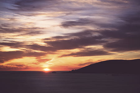 silhouette mountain during sunset thumbnail