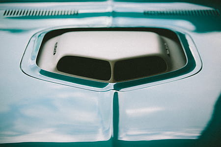 clear focus photography of green vehicle hood with black hood scoop thumbnail