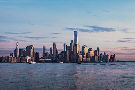 golden hour photography of New York under clear blue sky thumbnail