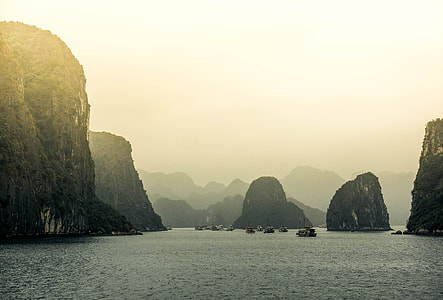 rock mountain surrounded with bodies of water thumbnail