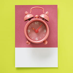pink bell alarm clock reading at 10:07 thumbnail