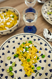 Risotto with broad bean on a cute plate with blue hearts thumbnail