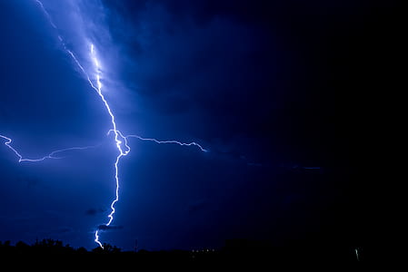 blue lightning during night time thumbnail