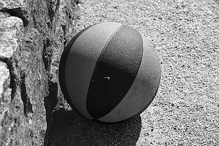 black and white basketball in greyscale photography thumbnail