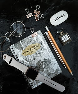 flat-lay photography of notebook and pencil thumbnail