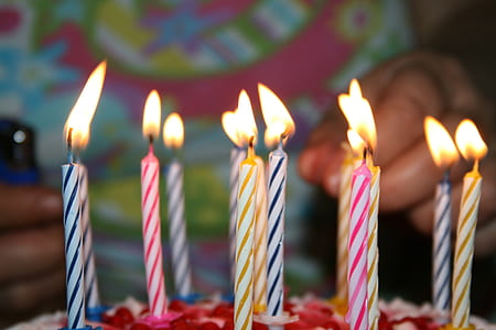 selective focus photography of lighted cake candles thumbnail