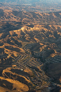 aerial view of city on desert plains thumbnail