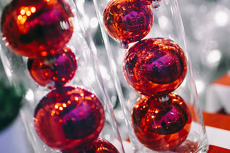 Red Christmas baubles packed in plastic tubes thumbnail