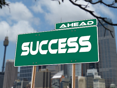 green and white success signage thumbnail