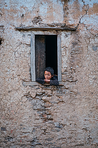 boy leaning on window thumbnail