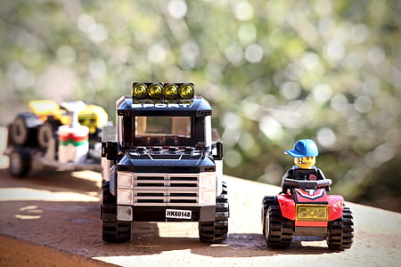 Lego man riding ATV with Sport vehicle toys thumbnail