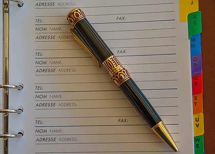 black and brown pen on notebok thumbnail