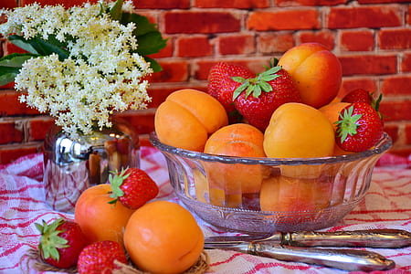 bowl of peach and strawberries on the table thumbnail