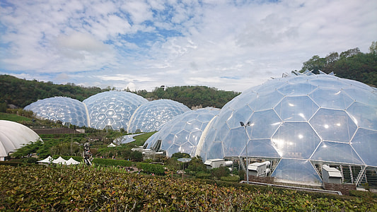 five dome buildings surrounded by trees thumbnail
