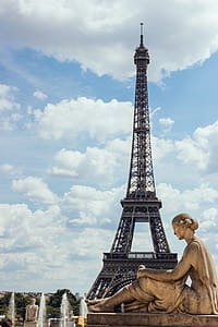 A Woman s statue at the Trocadero with Eiffel Tower in the background thumbnail