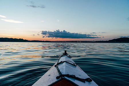 boat maneuvering ahead through island thumbnail
