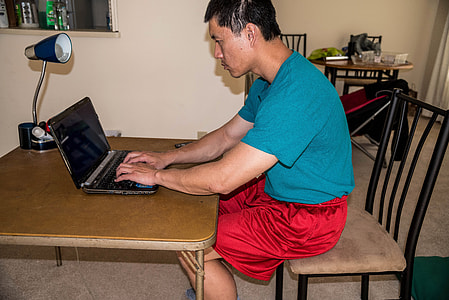 Man working on laptop thumbnail