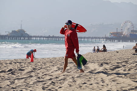 man carrying floating device thumbnail