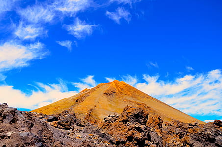 brown mountain under clear sky thumbnail