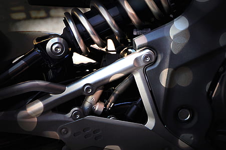 black and gray shock absorber thumbnail
