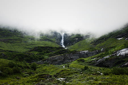 green mountain covered with clouds thumbnail
