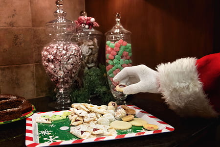 person putting a cookies on tray thumbnail