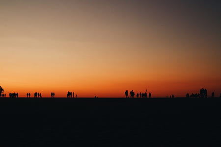 silhouette photo of people walking thumbnail