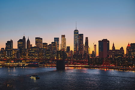 panoramic aerial photography of Brooklyn Bridge and New York city's skyline during golden hour thumbnail