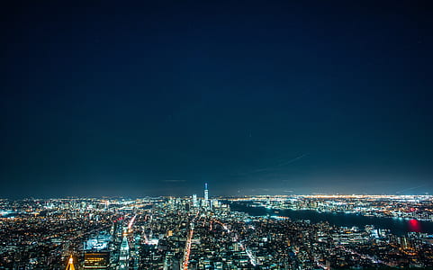 aerial photography of buildings during nighttime thumbnail