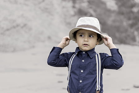 boy wearing beige and brown fedora hat thumbnail