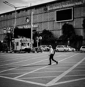 person walks on street thumbnail