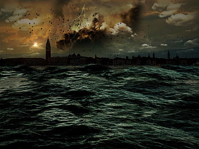 photo of tower near body of water thumbnail