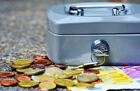 closeup photo of coins near case thumbnail