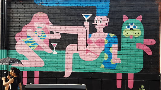 woman in pink bikini riding on animal graffiti thumbnail