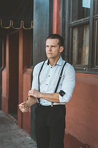 Man Wearing Teal Dress Shirt With Black Pants thumbnail