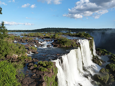 waterfalls under blue sky thumbnail