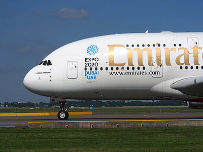 Emirates passenger plane on runway thumbnail
