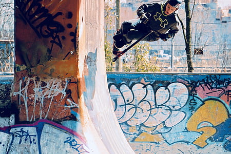 man riding kick scooter on ramp thumbnail