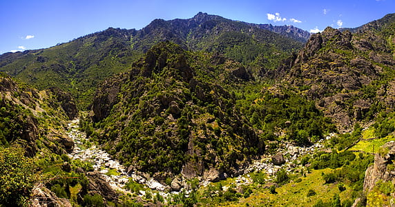 mountain under clear blue sky thumbnail