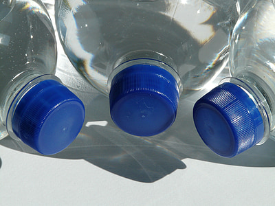 three closed blue and clear plastic bottles thumbnail