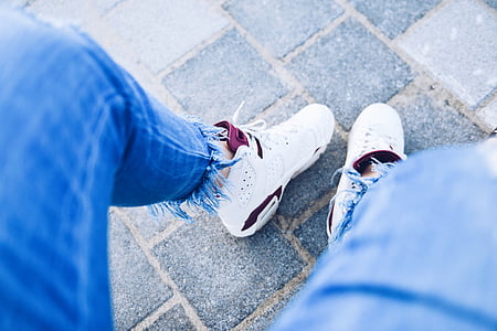 person wearing white Air Jordan 6's thumbnail