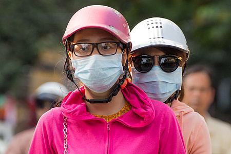 two women wearing helmets thumbnail