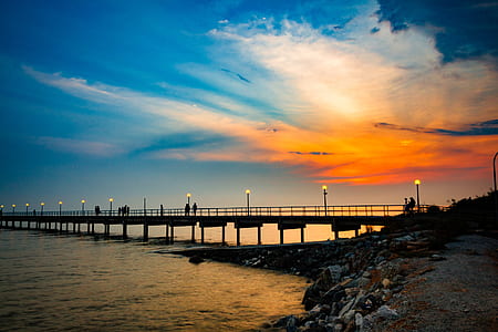 people walking on dock and golden time thumbnail