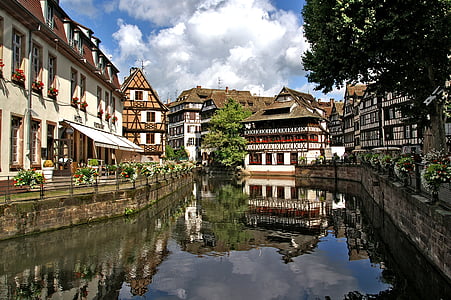 body of water near on buildings thumbnail