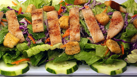 cooked food on top of vegetables thumbnail