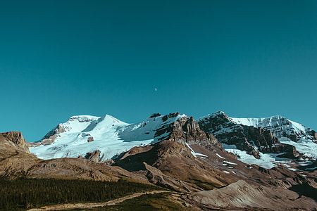 landscape photo of snow filled mountain thumbnail