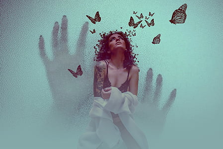 woman wearing black bra holding white cover thumbnail