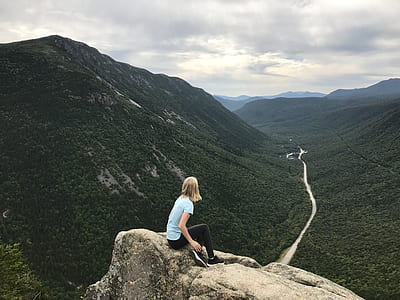 woman sitting on cliff thumbnail